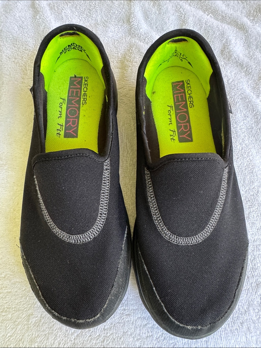 Skechers Black Slip-On Sneakers with Neon Green Insole